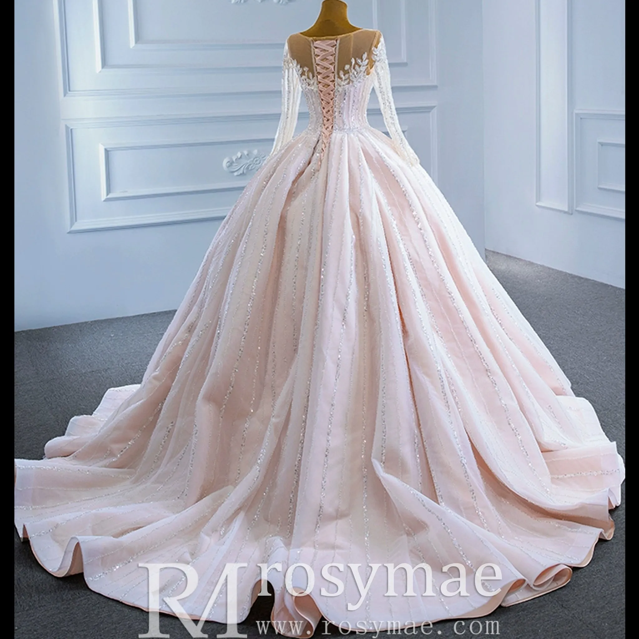 Luxury Beaded Blush Ball Gown Wedding Dress with Long Sleeves