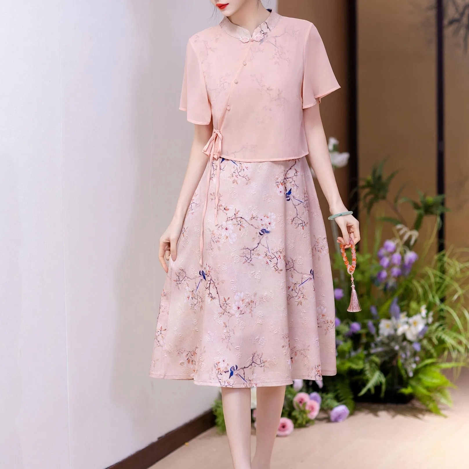 Mid-Length Mesh Qipao Featuring Elegant Pleats and Floral Prints