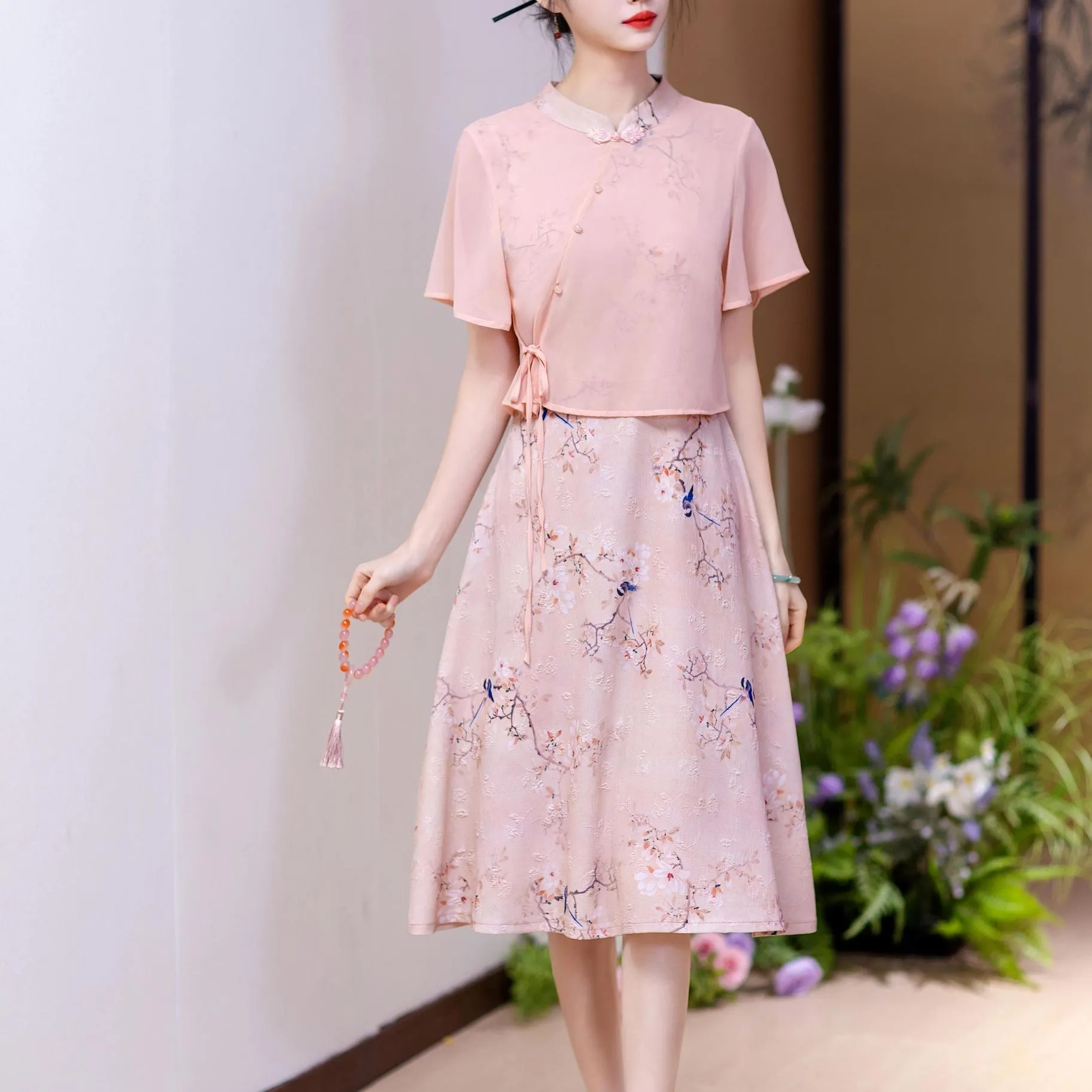 Mid-Length Mesh Qipao Featuring Elegant Pleats and Floral Prints