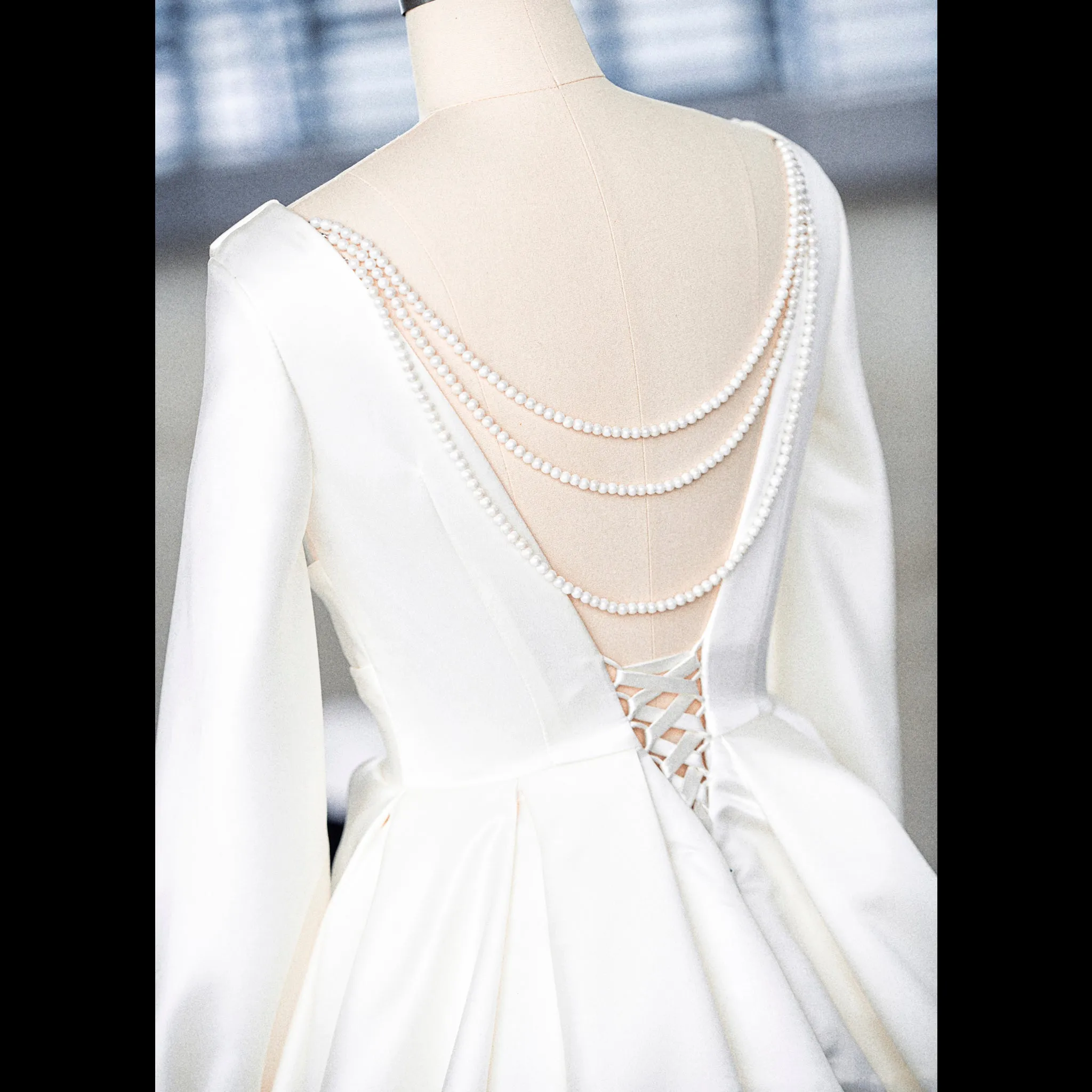 Modern Satin V-neck Ball Gown Wedding Dress with Long Sleeve