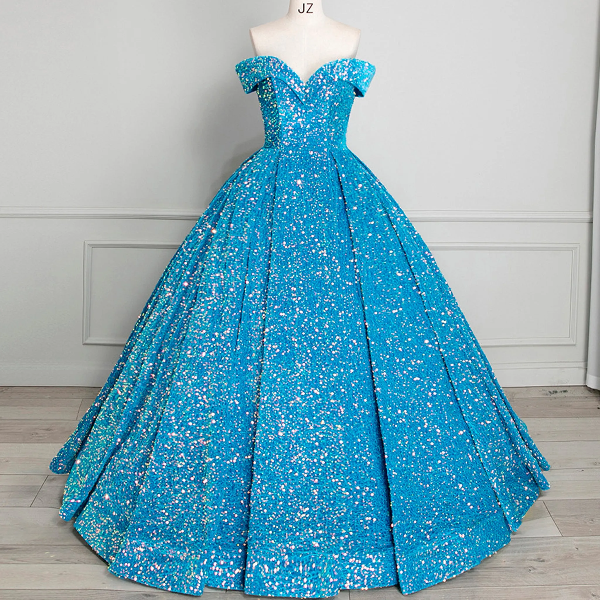Off Shoulder V Neckline Sparkly Quinceanera Ball Gown