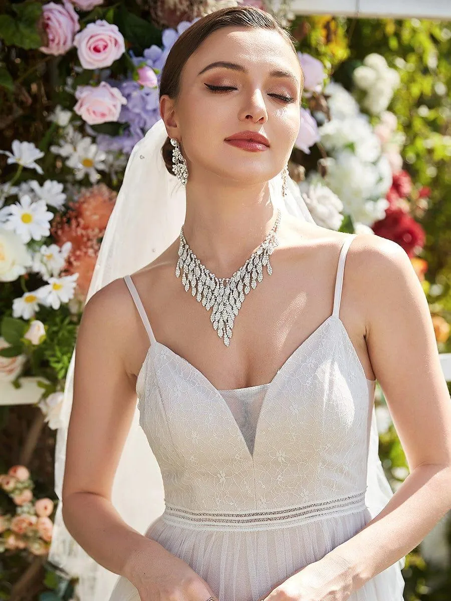 Robe de mariée A-ligne en V profond brodée à bretelles spaghetti(Vente finale)