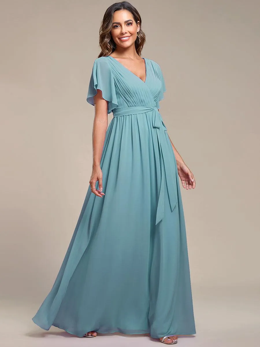 Robe mariage invitée en mousseline de soie à encolure en V et à manches flottantes