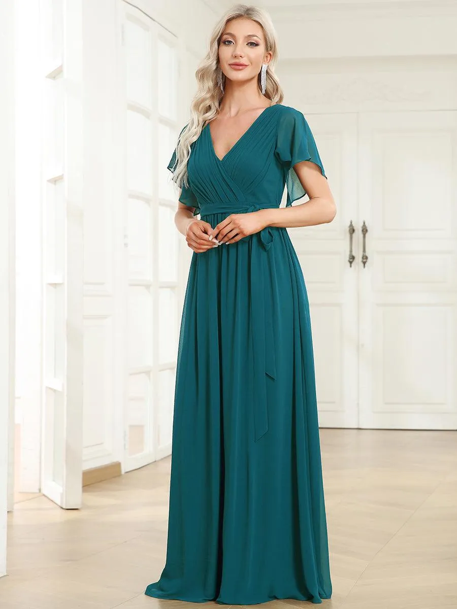 Robe mariage invitée en mousseline de soie à encolure en V et à manches flottantes