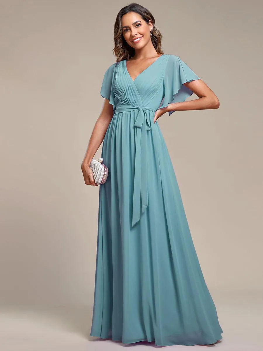 Robe mariage invitée en mousseline de soie à encolure en V et à manches flottantes