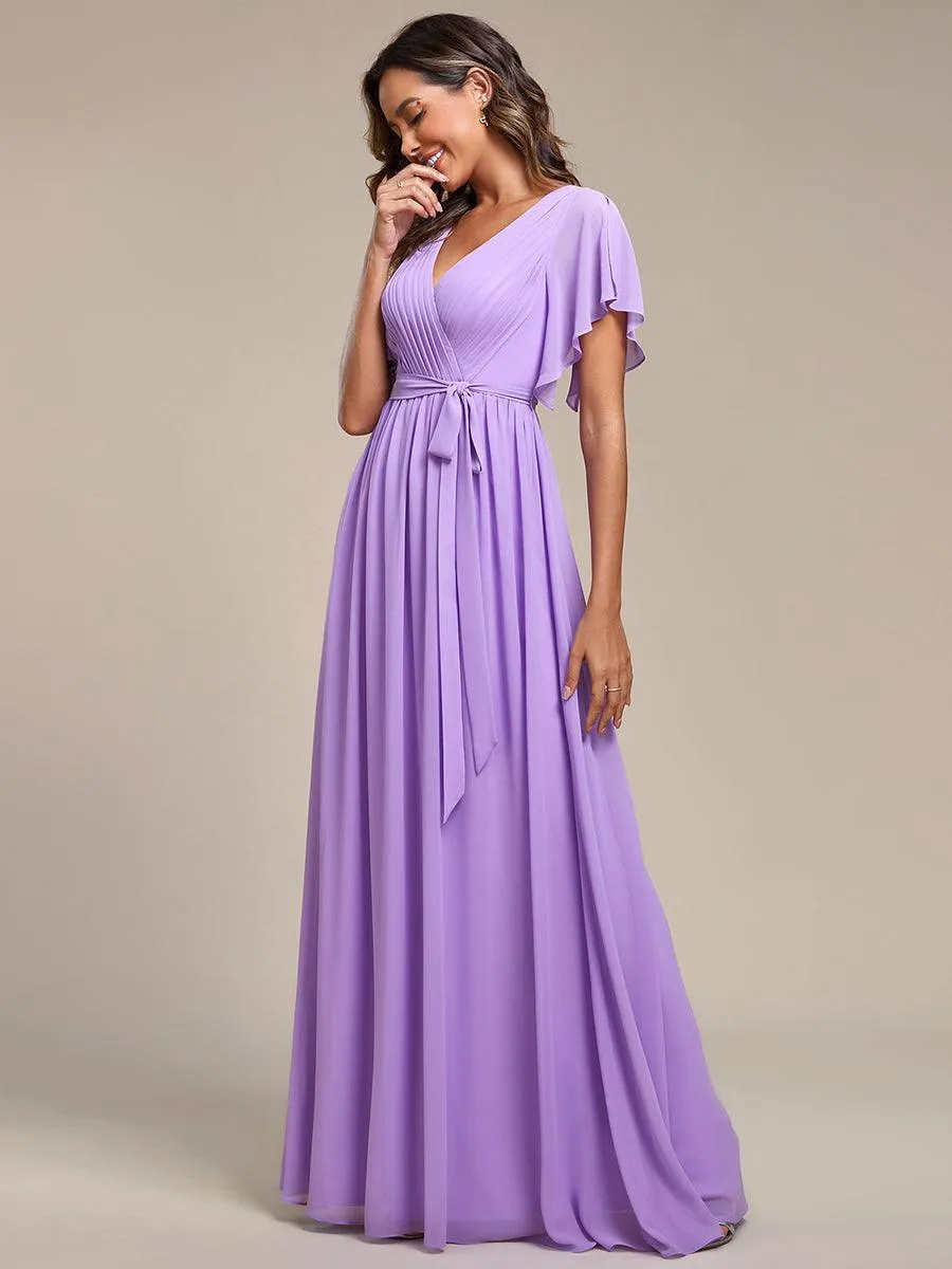 Robe mariage invitée en mousseline de soie à encolure en V et à manches flottantes