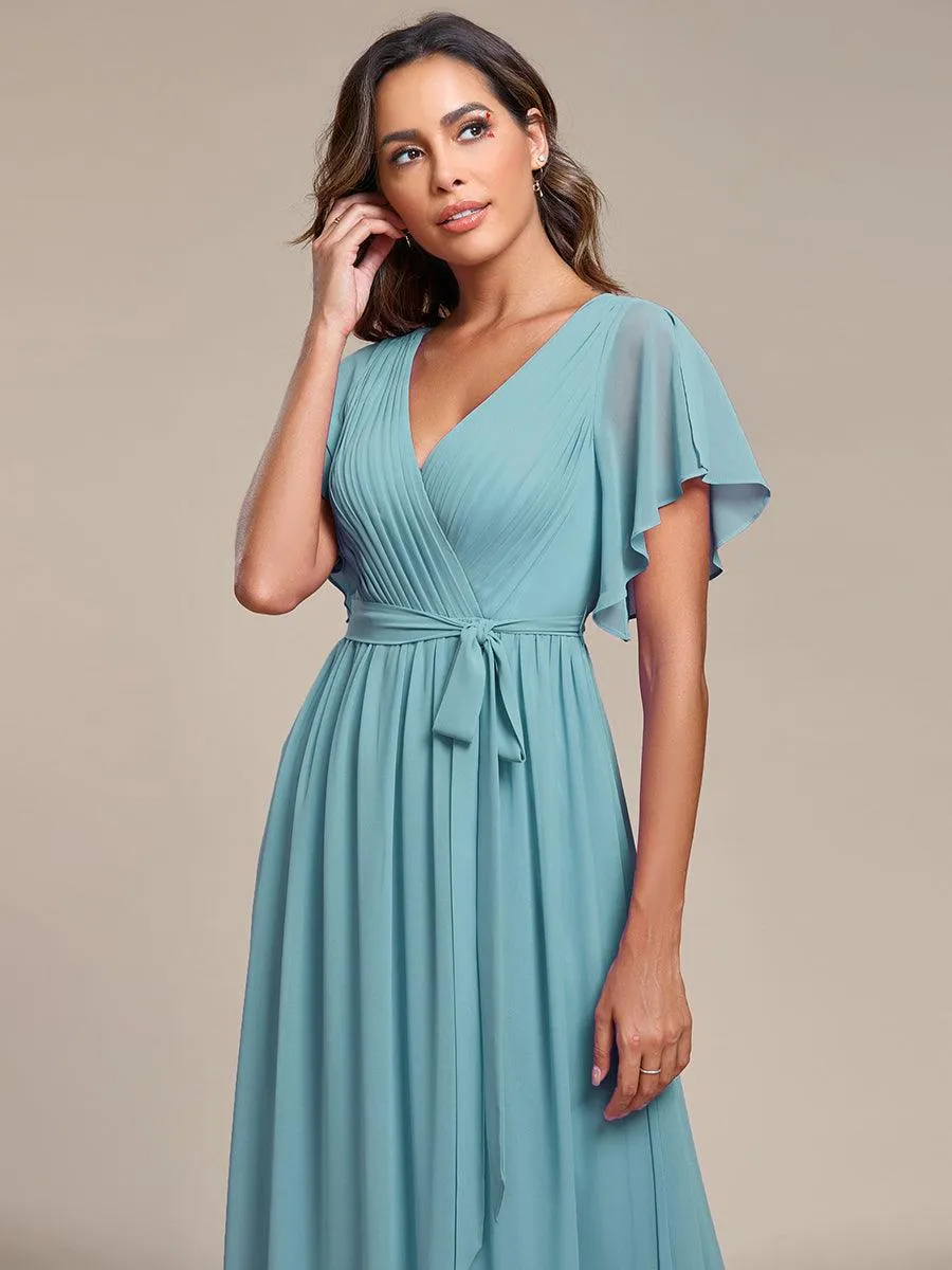Robe mariage invitée en mousseline de soie à encolure en V et à manches flottantes